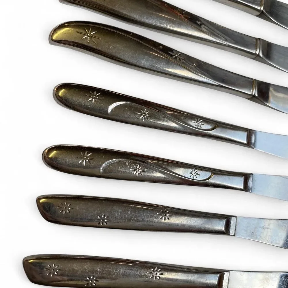 Vintage MCM Midcentury Modern Whimsigoth Set of 8 Silver Knifes Boho Star Motifs
